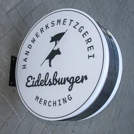 Zweiseitiger runder Leuchtkasten als Haubenausfürhrung